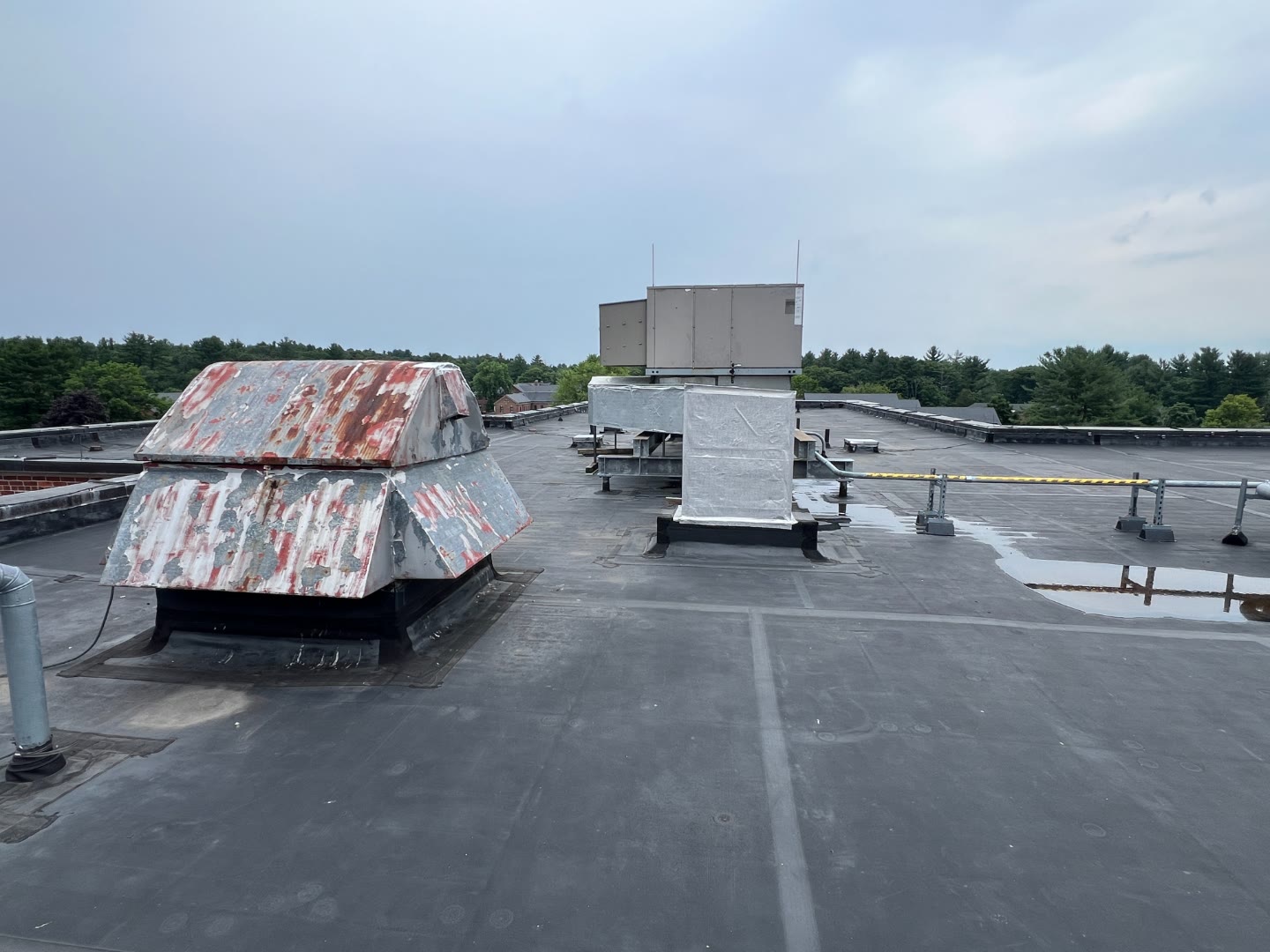 Commercial roof before TPO dark EPDM membrane