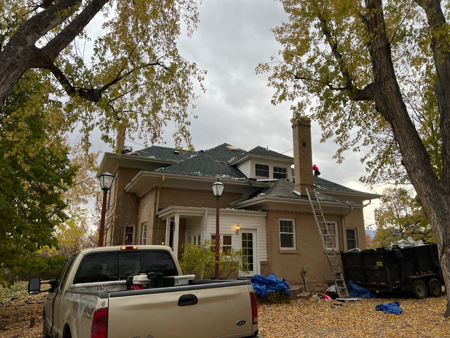 Historic brick home roof replacement in progress